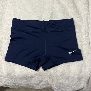 Navy blue Nike spandex, size Medium but fit like a small.